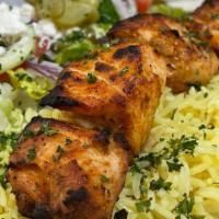 Chicken Kabob Plate · Flame grilled marinated cubed chicken cooked with our special seasoning - served with salad ...