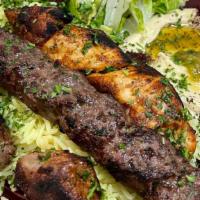 Mashawi Combo · Chicken lamb & kafta kabob - served with rice hummus pita & salad
