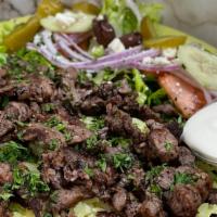 Beef Shawarma Plate · Thinly sliced marinated boneless beef mixed with our special spices - served with salad rice...