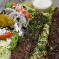 Kafta Kabob Plate · Flame grilled marinated ground beef flattened & cooked with our special seasoning - served w...