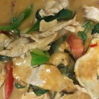 Panang Curry (Chicken Or Pork) · Panang curry paste, bell pepper, and basil.