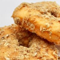Cinnamon Crumb · A square donut, covered in cinnamon crumb (contains almonds and oats).