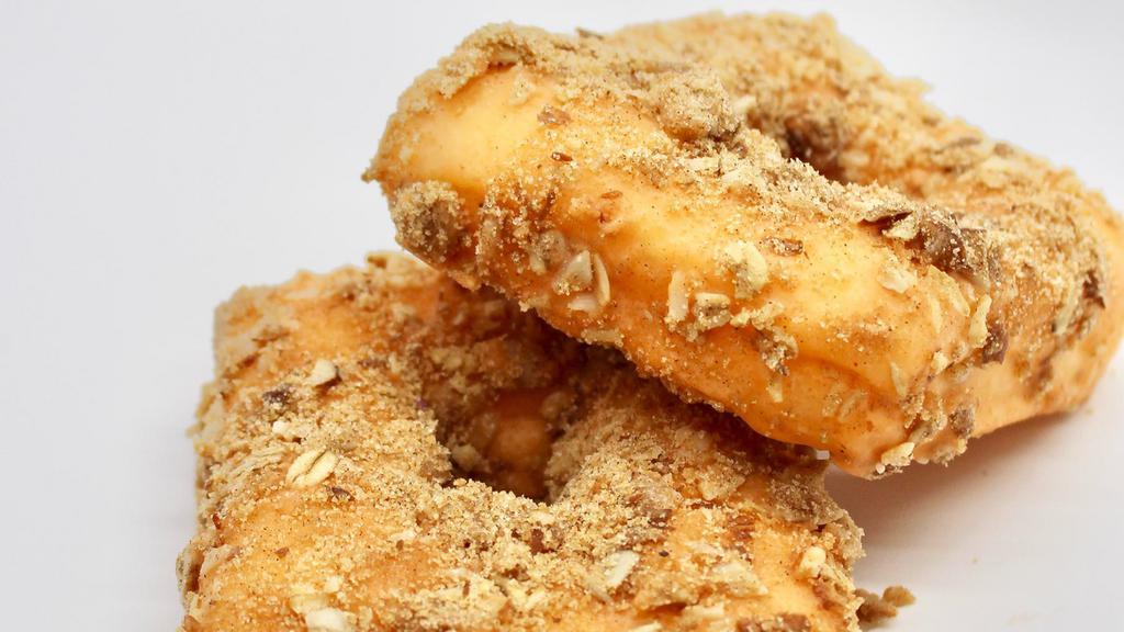 Cinnamon Crumb · A square donut, covered in cinnamon crumb (contains almonds and oats).