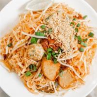 Pad Thai · Nuts. Stir-fried rice noodles with peanuts, veggie meat, meatballs, ham and bean sprouts. Wi...