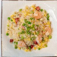 Combination Fried Rice / 招牌燴飯或炒飯  · With seafood, chicken and BBQ pork.