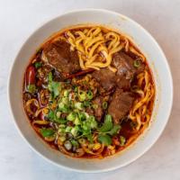 Szechuan Beef Noodle · 川味紅燒牛肉麵 
Spicy. Simmered in a unique blend of spices, 
our signature dish.
