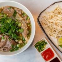 Special Pho-Vietnamese Style · 越南特别牛肉粉 
Rare ribeye, beef meatball, beef stew, beef tendon.
