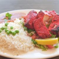 Paneer Tikka  · Cubes of homemade Indian cheese marinated with our special red sauce with yogurt and herbs, ...