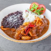 Pollo Con Mole *Gf · Tender chicken breast in a dark-red sweet and
spicy Mexican sauce, consisting of Mexican
cho...