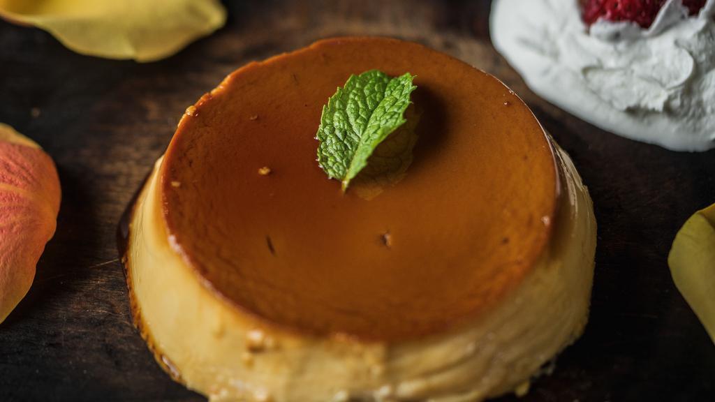 Caramel Flan · Served atop a river of caramel syrup.
A rich and creamy custard dessert with a layer
of soft caramel on top