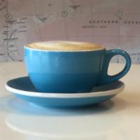 Cappuccino · Double shot of espresso with steamed micro foam milk.