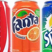 Canned Soda · Grab a canned soda of your choice, served cold.