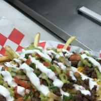 Asada Fries · French fries, cheese, steak Beef, pico, guac and sour cream.