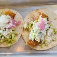 Fish Street Tacos · honey Lime slaw, pickled red onion, cotija cheese, flour tortilla.