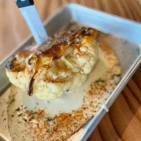 Roasted Cauliflower · Herbs, brown butter, Beecher's cheese fondue