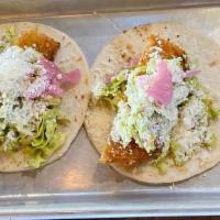 Fish Street Tacos · honey Lime slaw, pickled red onion, cotija cheese, flour tortilla.