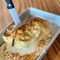 Roasted Cauliflower · Herbs, brown butter, Beecher's cheese fondue