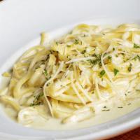 Fettuccine Alfredo Small (With Chicken) · Fettuccine tossed with our homemade, rich and creamy Alfredo sauce; topped with Parmesan.
