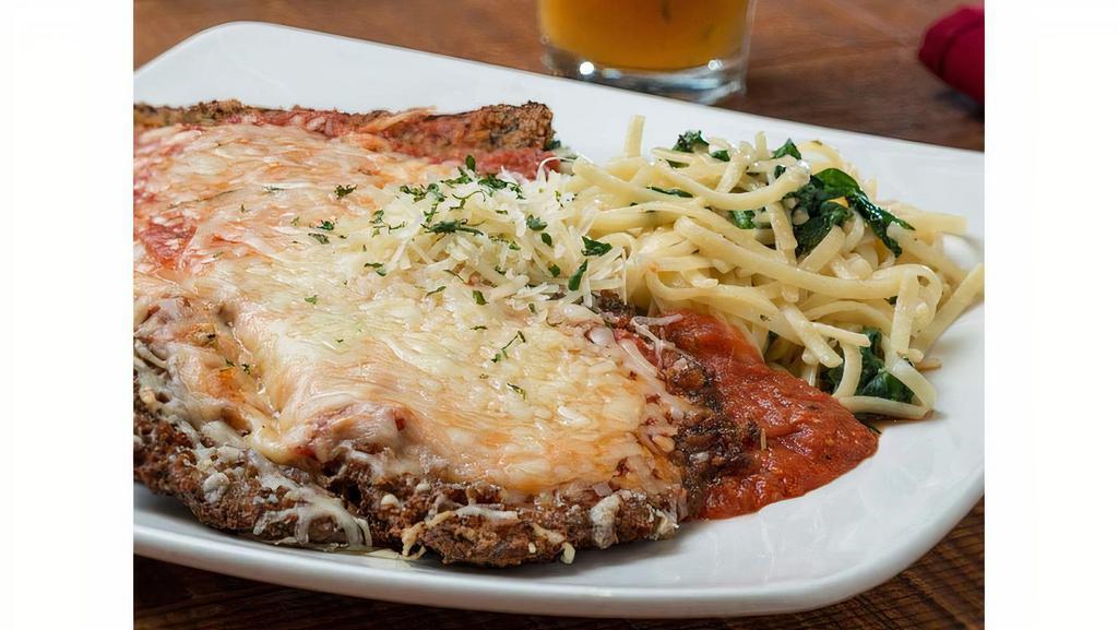 Eggplant Parmigiana Small (Serves 10-15) · Baked with marinara and a blend of four cheeses; served with marinara and linguini with sauteed spinach.