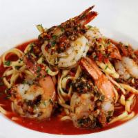 Shrimp Fra-Diavolo Small (Serves 8-10) · The “devil’s shrimp”, served with spicy marinara sauce and linguini.