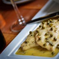 Chicken Piccata Large (Serves 11-15) · Sauteed chicken, capers, lemon, cream, white wine and parsley; served with bowtie rosa.