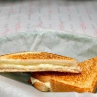 Kids Grilled Cheese · Small grilled cheese on white bread with white american cheese