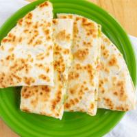 Mini Quesadilla · Dry-grilled flour or whole wheat tortilla with Jack cheese.