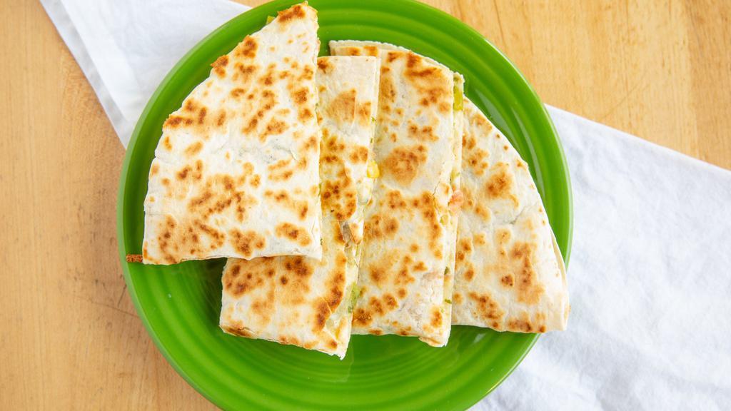 Mini Quesadilla · Dry-grilled flour or whole wheat tortilla with Jack cheese.