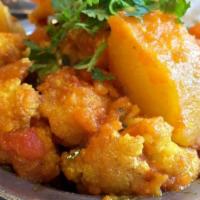 Alu Gobi · garlic and turmeric sautéed potatoes and cauliflower