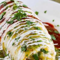 Wet Burrito · All our wet burritos come with rice and beans ur choice of meat Asada , Chicken,Ground Chick...