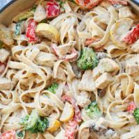 Chicken Alfredo · Chicken Alfredo, salad and garlic bread