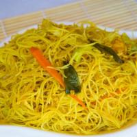 Singapore Fried Rice Noodles · Fresh rice noodles stir fried with fresh vegetables in a slightly spicy yellow curry - delic...