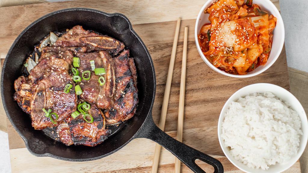 Kalbi Short Ribs · Grilled beef short ribs in house special soy garlic marinade.