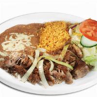 Antojo Carnitas · Tender pork fired with onions and spices. Served witj rice, beans, pico de gallo and handmad...