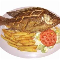 Deep Fried Mojarra (Tilapia) · Deep fried tilapia, served with rice and beans or salad and fries.