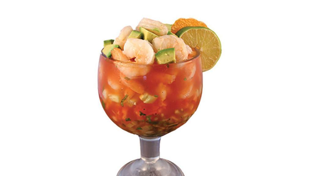 Cocktail De Camaron (Shrimp Cocktail) · Served on shrimp juice, with onions, tomato, cilantro, cucumber and avocado.