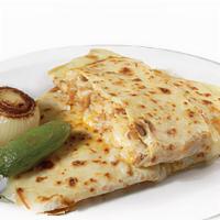 Single Quesadilla  · Flour tortilla filled with melted cheese, with your choice of meat, onions, cilantro, and sa...