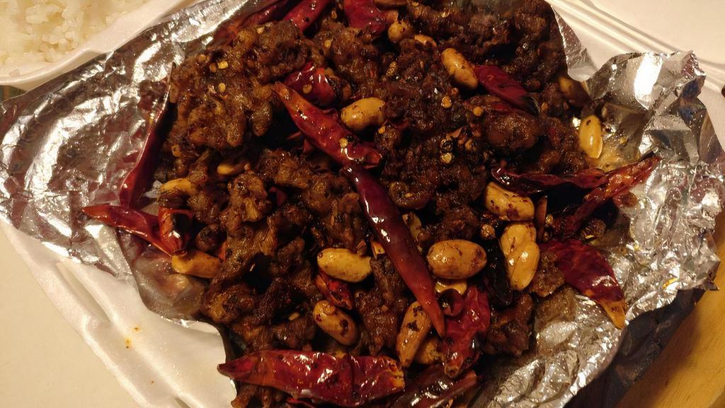 Szechuan Spicy Beef · Spicy. Stir fry beef(deep fried) with Peanut, Black Peppercorns and Szechuan Dried Chili.
