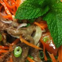 Yum Salad · Tomatoes, cucumbers, carrots, shallots and green onions tossed with lime juice and fish sauc...