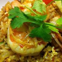 Curry Fried Rice · Rice stir fried with yellow curry powder, eggs, cashews, tomatoes and onions, your choice of...