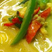 Green Curry · Blend of thai spices infused in green curry paste with bamboo shoots, eggplants, zucchini, b...