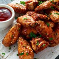 Bbq White Chicken (3 Pieces) · Two tasty white chicken breast pieces and a wing. Topped with BBQ sauce.