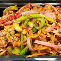 Mongolian Beef · Hot and spicy. Tender beef strips w/ sliced bell peppers, onions and carrots stir fried in a...