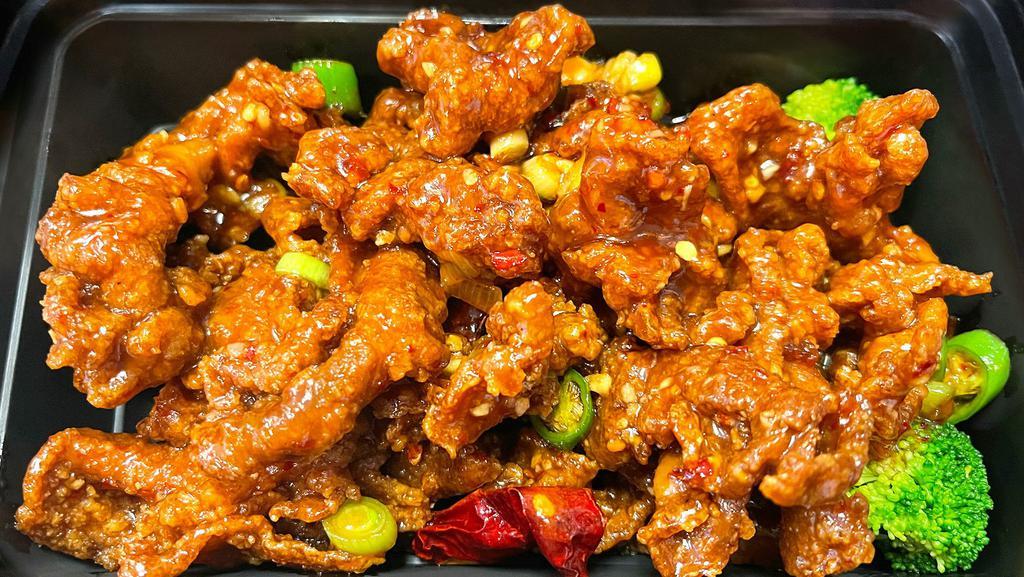 Hunan Beef · Hot and spicy. Crispy beef glazed in a spicy Hunan sauce