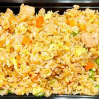 Chicken Fried Rice · Steamed white rice stir-fried w/ chicken eggs peas & carrots and green onions.