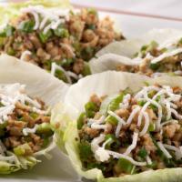 Chicken Lettuce Wrap · (Also available in shrimp, combination or vegetarian) Minced chicken w/ mushroom, water ches...
