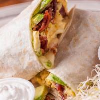 Eric'S Breakfast Burrito · The original... Jumbo flour tortilla wrapped around scrambled eggs, Jack cheese, house made ...