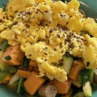 Sweet Potato Breakfast Bowl · Sweet potatoes, green onions, zucchini, green bell peppers, spinach and your choice of prote...