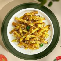 Garlic Parmesan Fries · Signature golden french fries tossed in parmesan and garlic