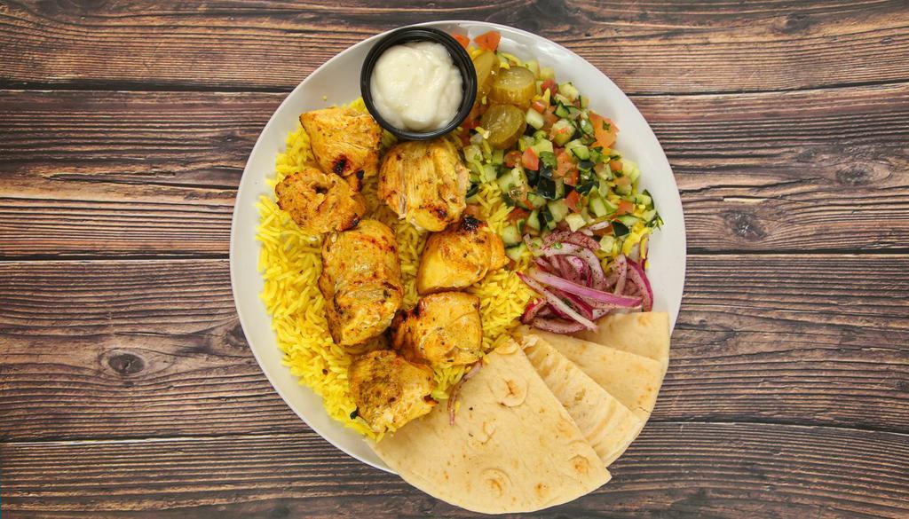 Rice Bowl - Build Your Own · Choice of protein, choice of toppings, and sauce. Served with pita bread. 
(Includes 1 full-size protein if one is selected, or 2 half-size proteins if 2 are selected)